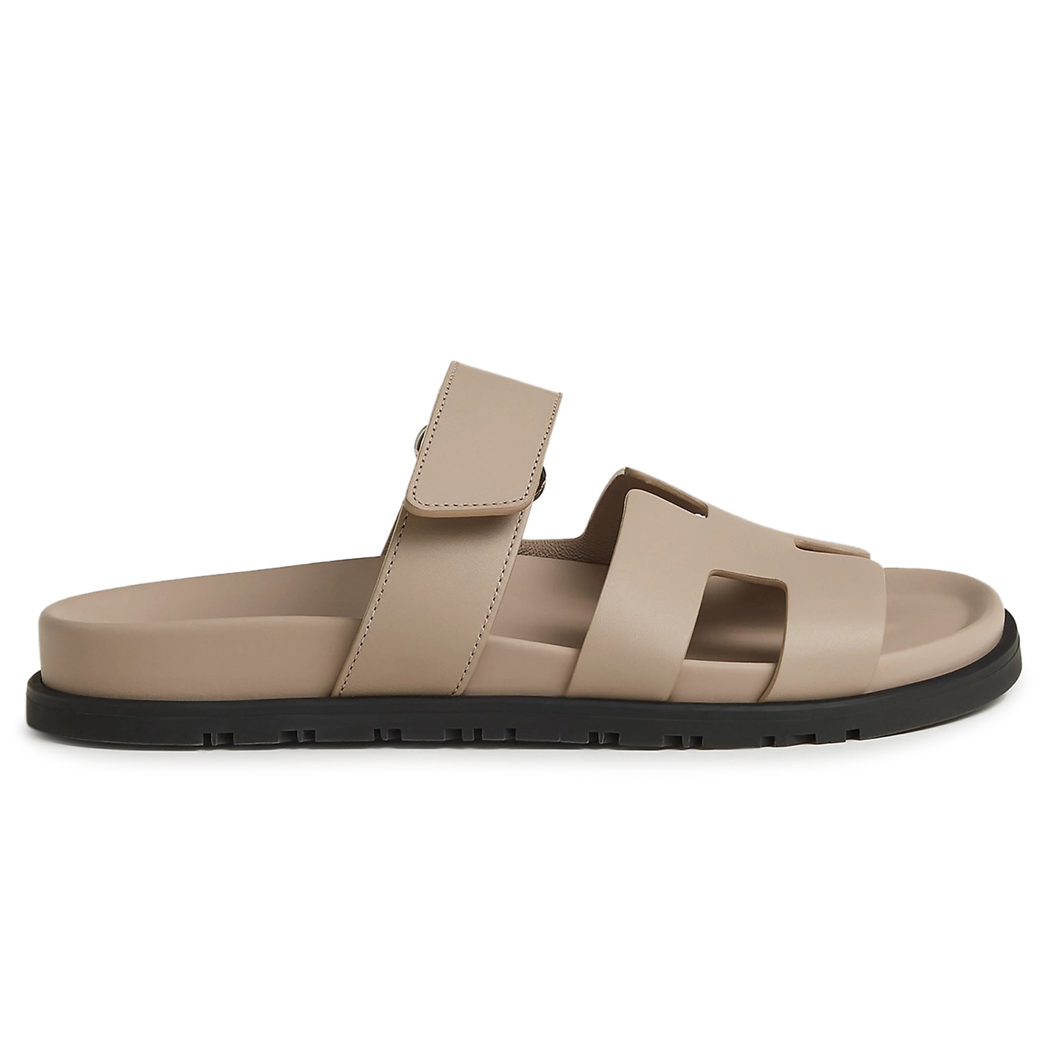 Side view of Hermes Paris Chypre Sandal Beige Mastic H222299ZVB3365